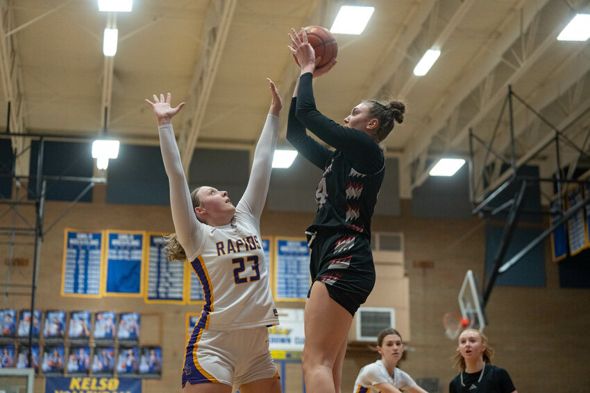 W.F. West&rsquo;s Julia Dalan takes a shot during the Bearcats&rsquo; 59-28 District 4 Championship win over Columbia River at Kelso High School on Friday, Feb. 21.