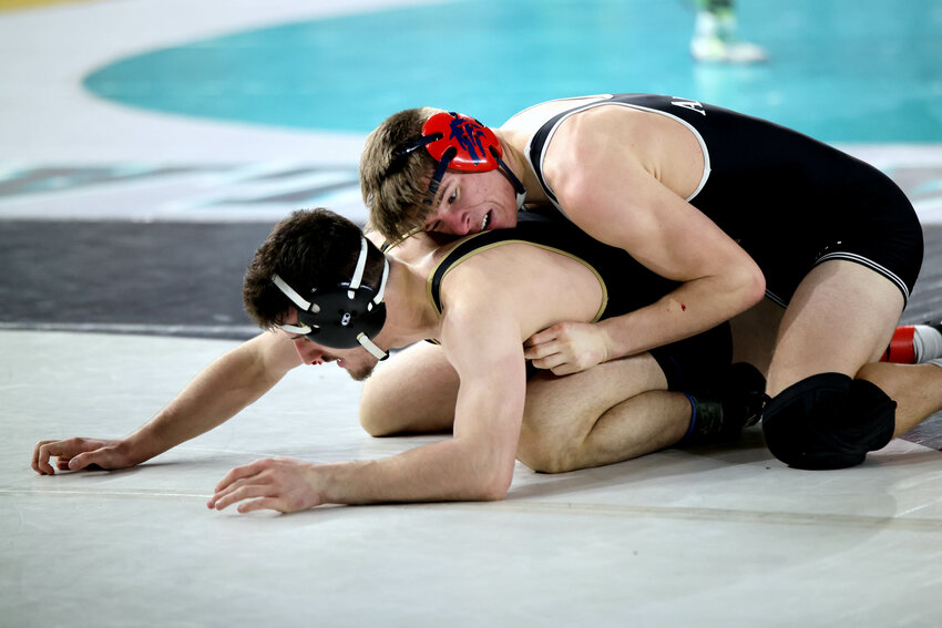 Black Hills' Ammon Combs wrestles Sequim's Aiden Glenn in a 165-pound bout at Mat Classic XXXVI on Friday, Feb. 21 inside the Tacoma Dome.