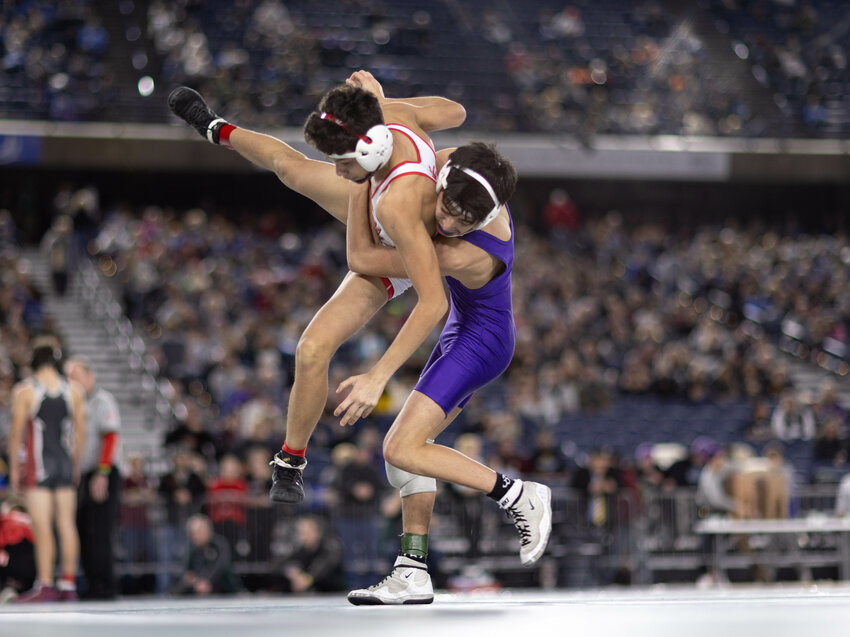 Onalaska's Benito Escalera wrestles a Class 1B/2B 120-pound consolation match at Mat Classic XXXVI on Saturday, Feb. 22 inside the Tacoma Dome.