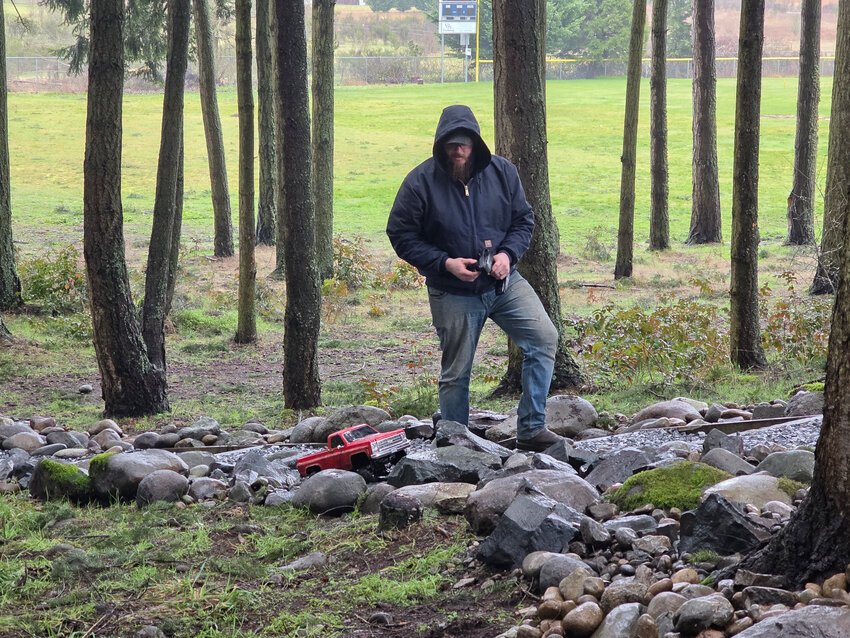A community member drives an RC truck through the rocks at the Yelm RC park on Feb. 23.