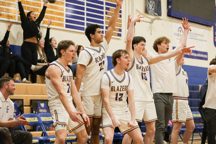 The Centralia College bench celebrates a three during CC's win over Pierce on Feb. 26.