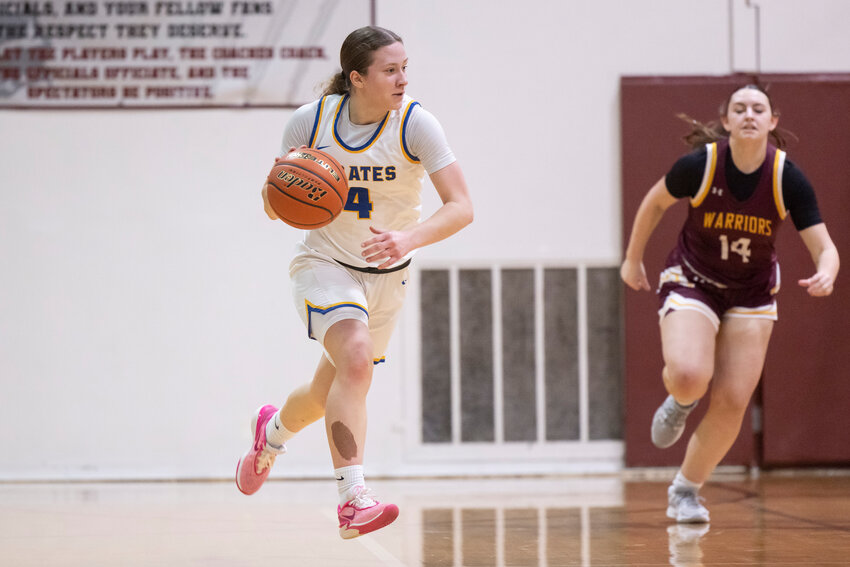 Adna&rsquo;s Karsyn Freeman (4) dribbles the ball during a 2B Girls State Opening Round against Cle Elum at W.F. West High School on Saturday, March 1.