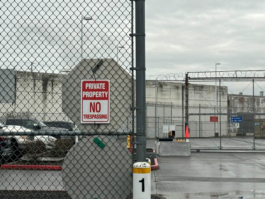 A &ldquo;no trespassing&rdquo; sign outside of Northwest ICE Processing Center. (Grace Deng/Washington State Standard)