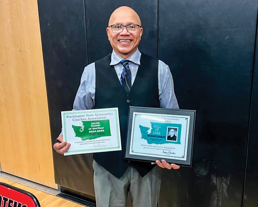 Ridgefield gymnastics coach Richard Samuels was named the all league coach of the year, all state coach of the year and was inducted into the Washington State Gymnastics Coaches Hall of Fame on Friday, Feb. 21.