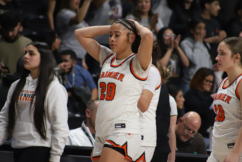 Rainier's Janess Blackburn (20) reacts after losing to Mabton in the 2B Girls State Tournament Round of 12 at Spokane Arena on Wednesday, March 5.