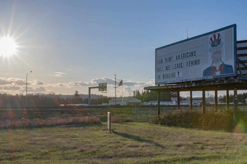 The sun descends towards the western horizon over the famous Uncle Sam billboard near Exit 72 on Interstate 5 in Napavine on Thursday, March 6.
