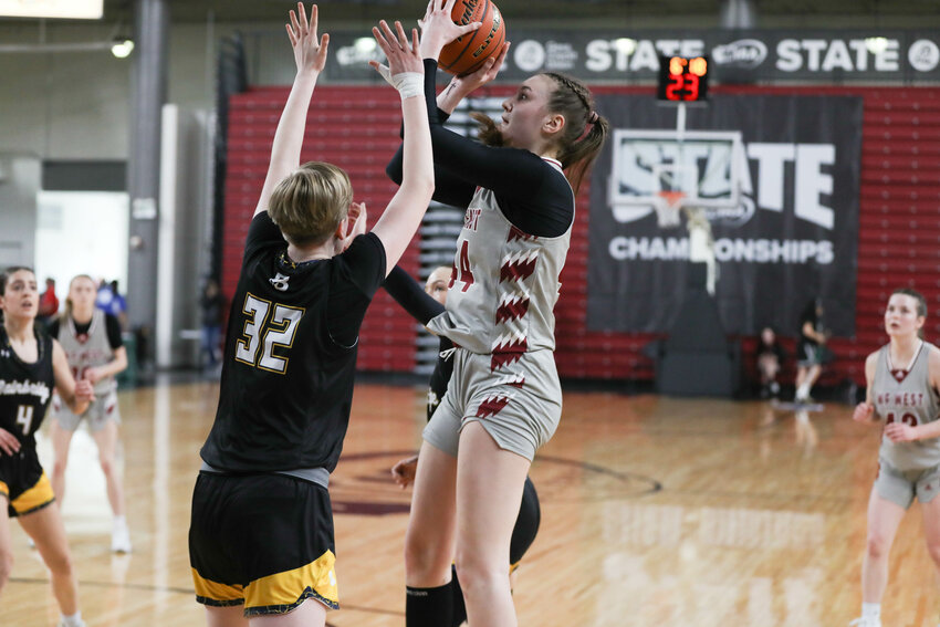 W.F. West's Julia Dalan shoots over a defender during W.F. West's 59-28 win over Bainbridge in a 2A State Tournament Consolation Game at the Yakima SunDome on March 7.