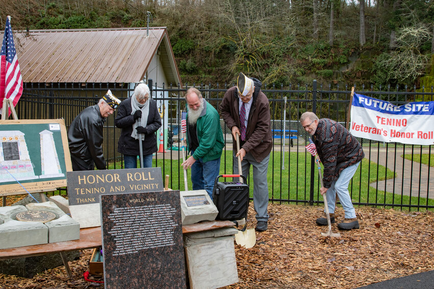 Tenino Mayor Dave Watterson addresses attendees at the groundbreaking for the Tenino Veterans' Honor Roll Memorial Wall alongside Veterans of Foreign Wars Post 5878 Surgeon Frank Hicks on Saturday, March 8, at the Tenino City Park.