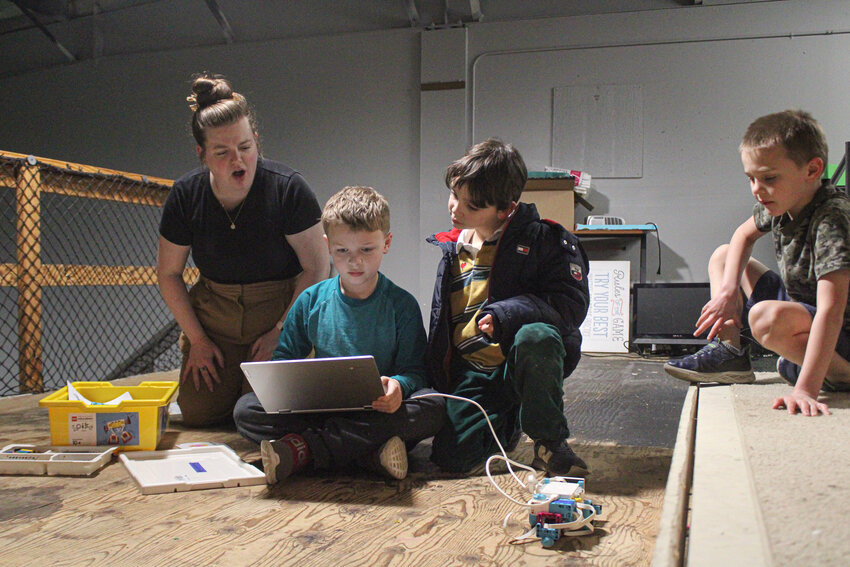 Two students work on their robot during a robotics class at YARD on Feb. 25.
