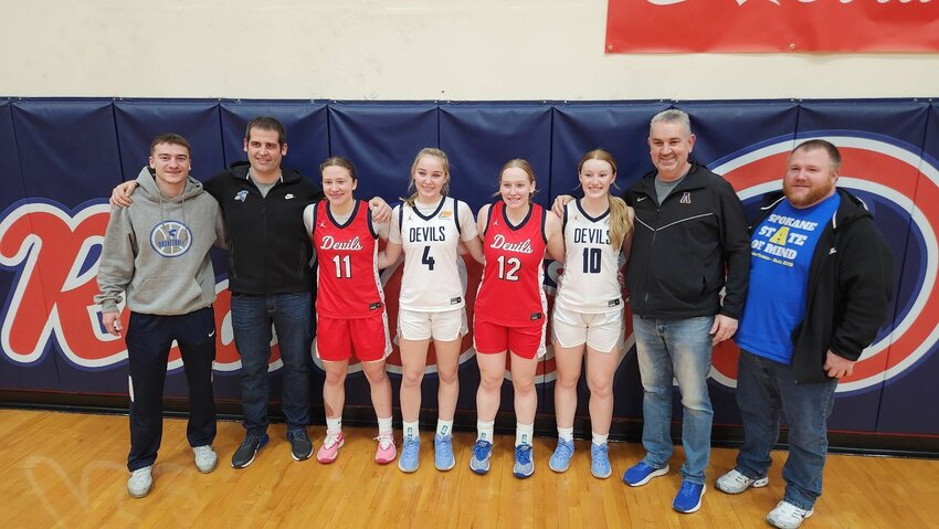 Adna&rsquo;s Karsyn Freeman (11) poses with Adna teammates Danika Hallom (4), Kendall Humphrey (12), Gaby Guard (10) and the Adna coaching staff after the LCC Senior All-Star Game on March 11.