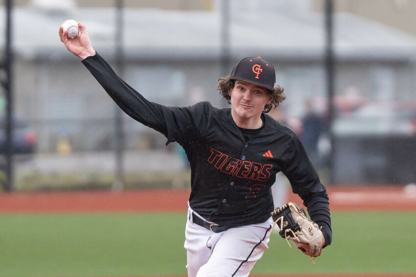 Centralia&rsquo;s Brock Boone throws a pitch during a 12-2 loss to Rochester at Fort Borst Park in Centralia on Friday, March 14.