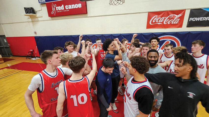 The LCC Senior All-Stars break down a huddle after the LCC Senior All-Star Game on March 11.
