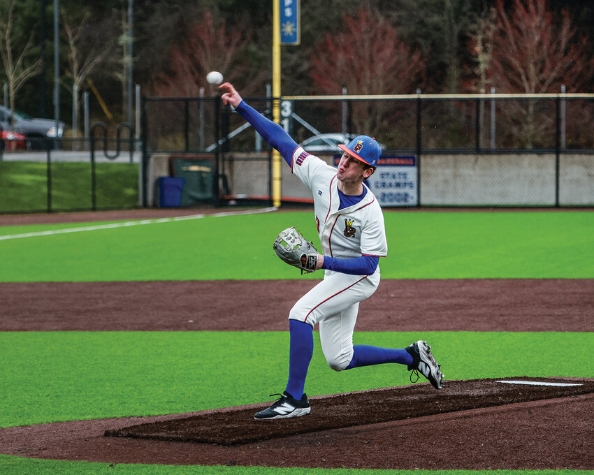 Ridgefield&rsquo;s Landon DeBeaumont throws a pitch during the Spudders&rsquo; 5-3 win over the Battle Ground Tigers on Friday, March 14.