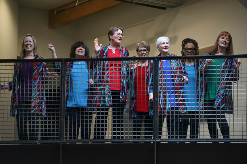 Members of six local women's groups and small business owners pose for a photo with the Thurston County Board of Commissioners and county staff to celebrate Women's History Month at The Atrium on Tuesday, March 18.