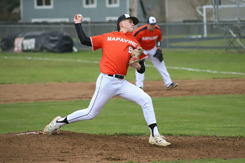 Napavine's Cal Bullock (9) winds up to pitch against Morton-White Pass at Napavine High School on Wednesday, March 19.
