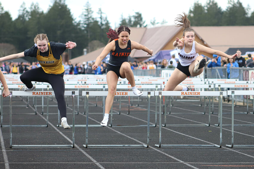 Toledo's Haylee Wolfe looks ahead as she runs the 1,600-meter race at the Rainier Icebreaker at Rainier High School on Saturday, March 22.
