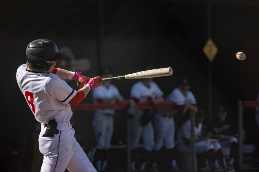 Tenino's Jude Leitch (8) hits the ball during a baseball game against Rochester at Tenino High School, March 25.