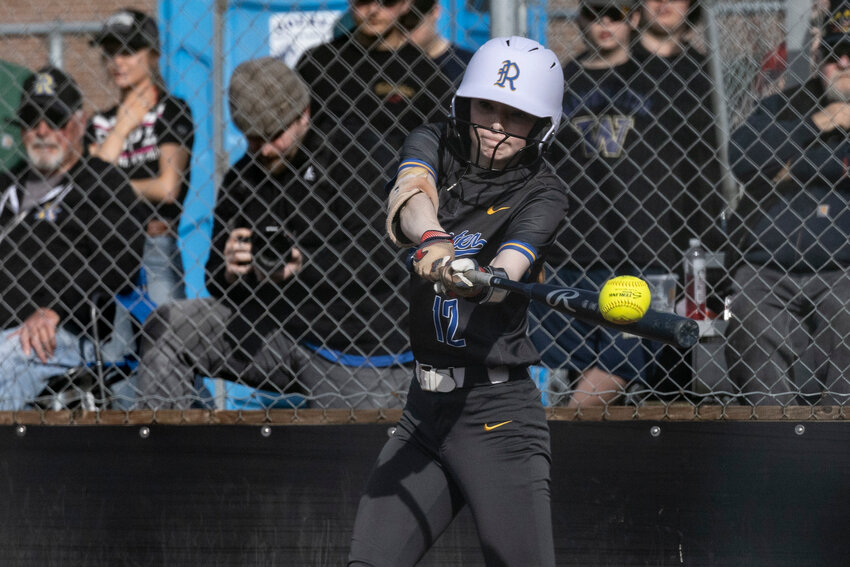 Rochester&rsquo;s McKenna Vassar (12) hits the ball during a softball game at Tenino High School, March 25.