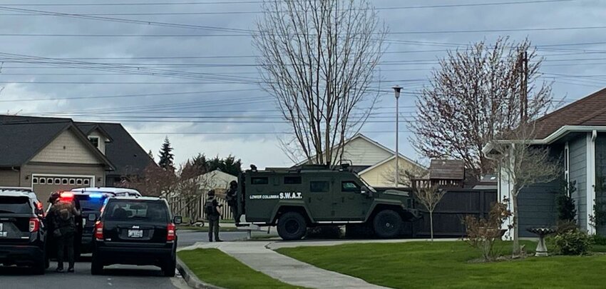 A SWAT vehicle is seen after police attempted to make contact with a suspect at a home on Thursday, March 27, in Longview.