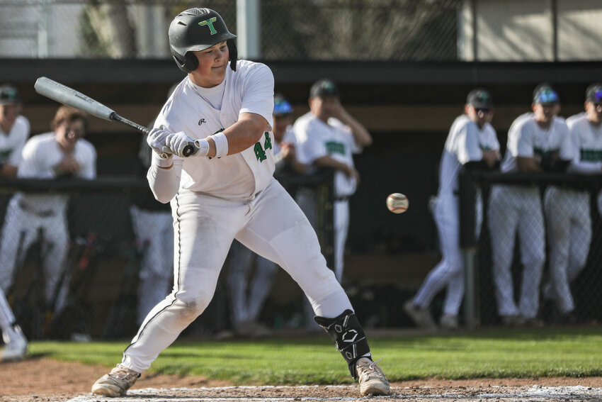 Tumwater&rsquo;s Landon Roy swings at the ball during a high school baseball game against Woodland at Tumwater High School on Thursday, April 3.
