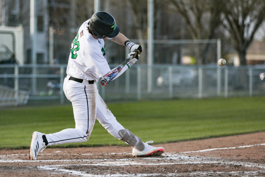 Tumwater&rsquo;s Derek Thompson swings at the ball during a high school baseball game against Woodland at Tumwater High School on Thursday, April 3.