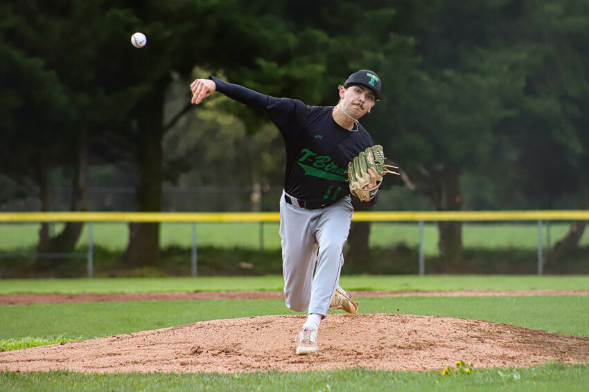 Tumwater's Luke Houk (11) throws a pitch against Black Hills at Black Hills High School on Thursday, April 10.