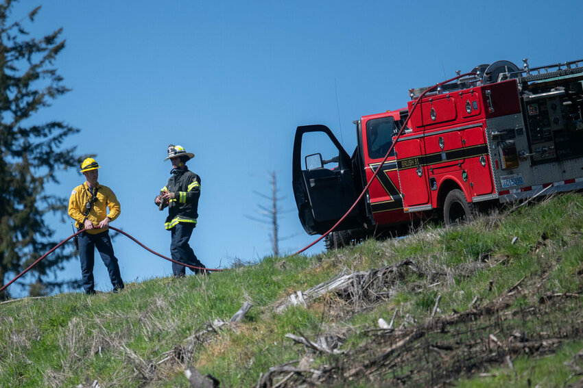 The Washington state Department of Natural Resources and Lewis County Fire District 5 respond to a wildfire off of Nando Lane in Napavine on Wednesday, April 17, 2024.