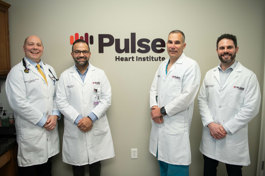From left, Drs. Timothy Larson, Hartaj Girn, Charles &ldquo;Rick&rdquo; Rossow and Zeid Nesheiwat pose for a photo at the Pulse Heart Institute clinic in Chehalis.