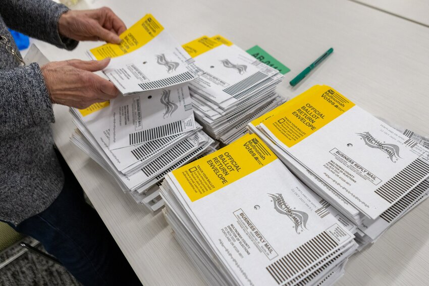 Official ballot return envelopes are stacked at the Multnomah County Elections Office in Southeast Portland on Thursday, Oct. 24, 2024.