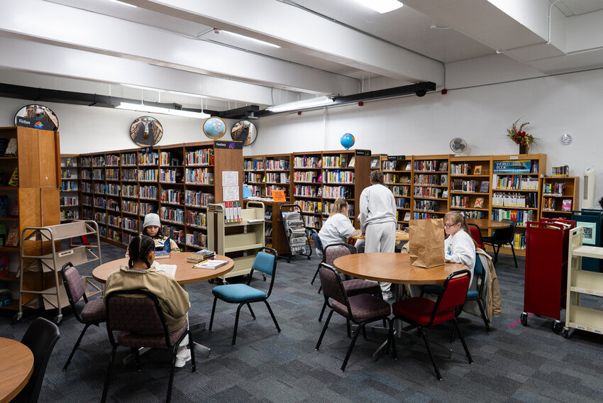 Inmates utilize the library at the Washington Corrections Center for Women on April 8.