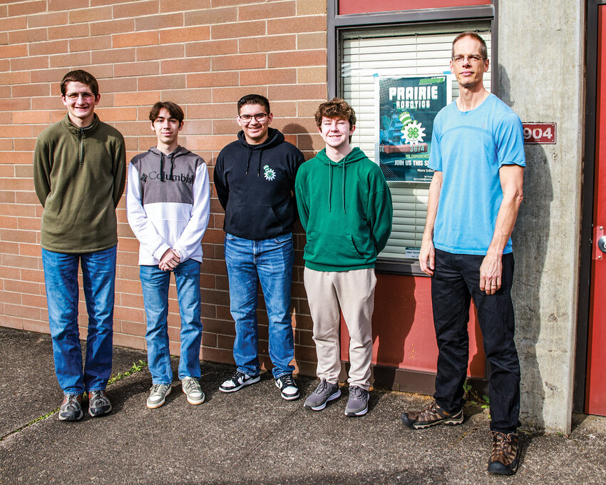Prairie High School students on the Cloverbots robotics team stand with teacher and adviser Todd Ferris as they qualified for the upcoming world championship tournament in Houston, Texas, April 16-20. From left to right are Seth Hartrim-Lowe, Phillip Chernoval, Eric Carbajal-Vargas, Desmond Sedaker and Ferris.