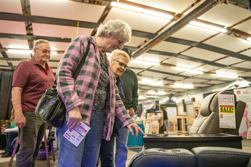 Marcella Gross admires an electric table at the 59th annual Lewis County Home Show at the Southwest Washington Fairgrounds on Friday, April 11. The show was organized and hosted by the Centralia-Chehalis Chamber of Commerce. It stretched through Saturday afternoon at the fairgrounds.