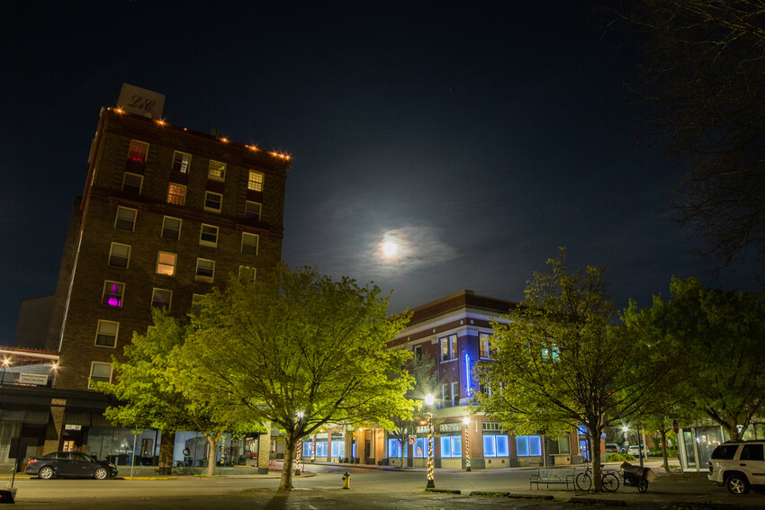 April's full moon, also known as a pink moon as it accompanies pink spring flowers, glows in the skies above downtown Centralia in these photos taken on Saturday, April 12. This full moon is also a micromoon, where the moon is the farthest away from the earth, or at the apogee, of its elliptical orbit. It appears around 14% smaller and 30% dimmer in the sky than its supermoon counterpart, where the moon is closest to the earth in its elliptical orbit at its perigee.