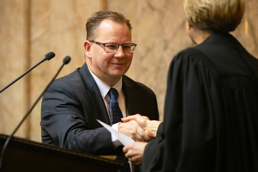 The office of Superintendent of Public Instruction Chris Reykdal, seen here being sworn into office on Jan. 15, 2025, has seen rising tensions with the federal government since President Donald Trump took office in January. (Photo by Ryan Berry/Washington State Standard)