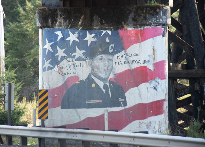 The mural of Sgt. Justin D. Norton is located on a lower segment of the train trestle bridge in Rainier.