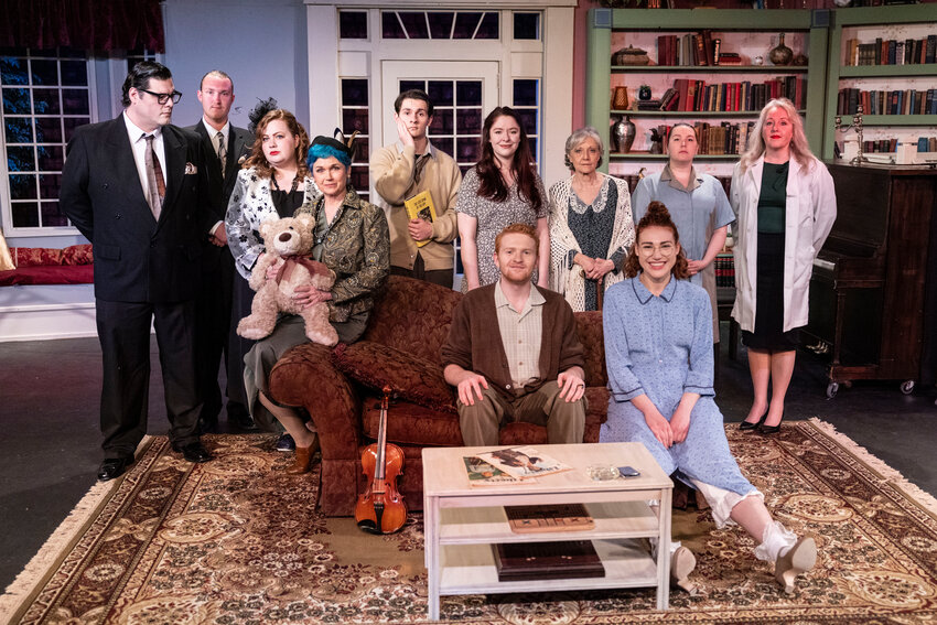 The cast of &ldquo;The Curious Savage&rdquo; poses for a photo before dress rehearsal at Evergreen Playhouse on Tuesday, April 15.
