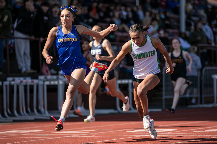 Rochester&rsquo;s Mercedies Dupont finishes ahead of Tumwater&rsquo;s Ava Jones during the girls 200-meter relay during the Chehalis Activators meet at W.F. West High School on Saturday, April, 19.