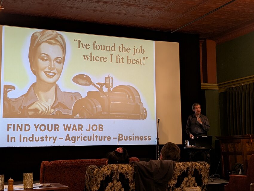 Former journalist, historian and author Sig Unander, of Portland, speaks about World War II during a presentation at McMenamins Olympic Theater in Centralia.