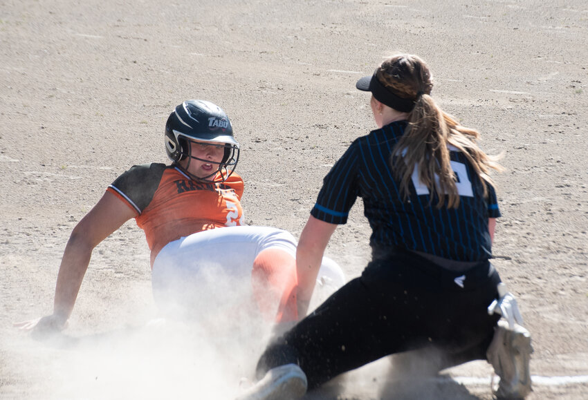 Keira Anderson slides into third against Toutle Lake at Rainier Elementary School on Thursday, April 17.