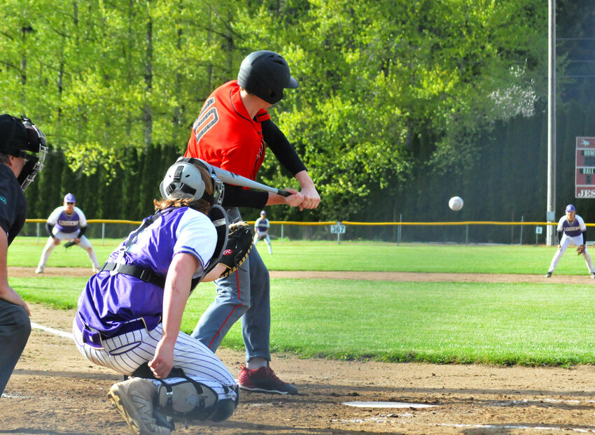 Mossyrock's Shaun Fry swings at a pitch during Mossyrock's win over Onalaska on April 21.