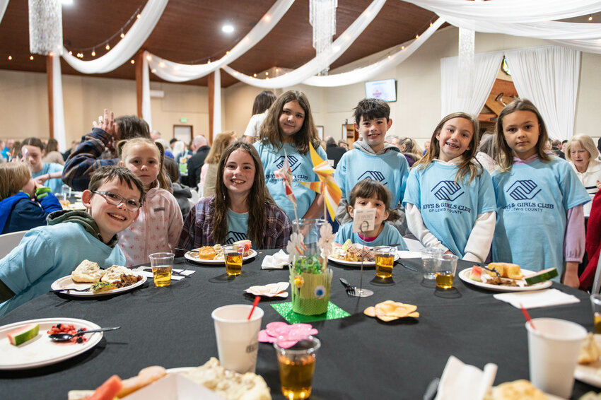 Boys and Girls Club members in attendance pose for a photo during the annual Boys and Girls Club of Lewis County &ldquo;Most Important Meal of the Year&rdquo; breakfast fundraiser at Jester&rsquo;s Auto Museum in Chehalis on Wednesday, April 23.