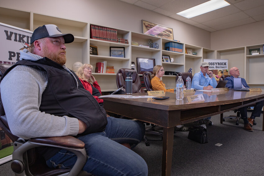 Starting on the left, Mossyrock School Board members Ben Callies, Denise Weise, Teresa Ekdahl-Johnson, Mitch Townsend and Mossyrock School District Superintendent Mark Chandler listen to public comment advocating for a district-sanction jr./sr. high school soccer team during the school board's meeting on Monday, April 21.