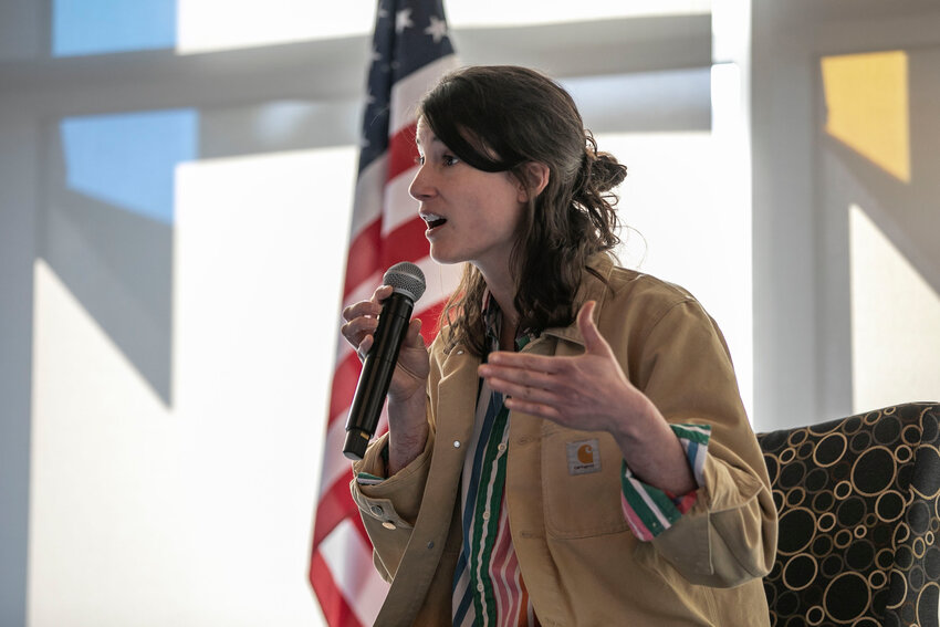 Congresswoman Marie Gluesenkamp Perez answers a question at a town hall in the TransAlta Commons at Centralia College on Tuesday, April 22.
