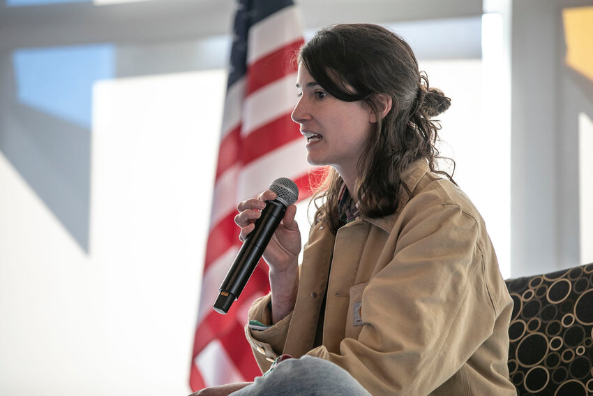 Congresswoman Marie Gluesenkamp Perez answers a question at a town hall in the TransAlta Commons at Centralia College on Tuesday, April 22.