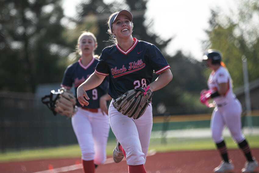 Black Hills' Kailey Miller smiles as she jogs off the infield against Centralia in an Evergreen Conference game at Fort Borst Park on Wednesday, April 23.