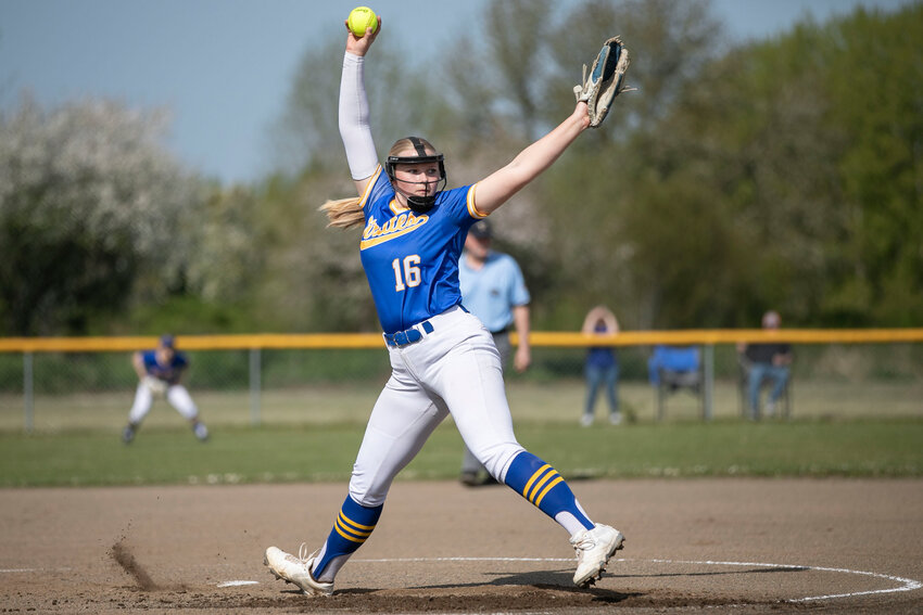 Adna’s Gaby Guard (5) swings at the ball during a softball game against Rainier at Adna High School on Thursday, April 24.
