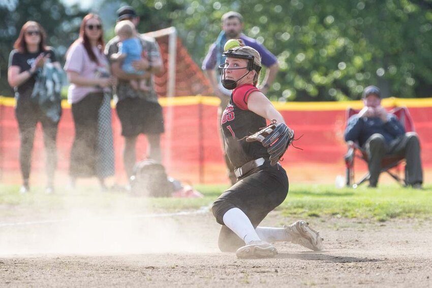 Mossyrock&rsquo;s Taylor Schwartz throws to first during a game versus Toutle Lake at Mossyrock High School on Thursday, April 24.