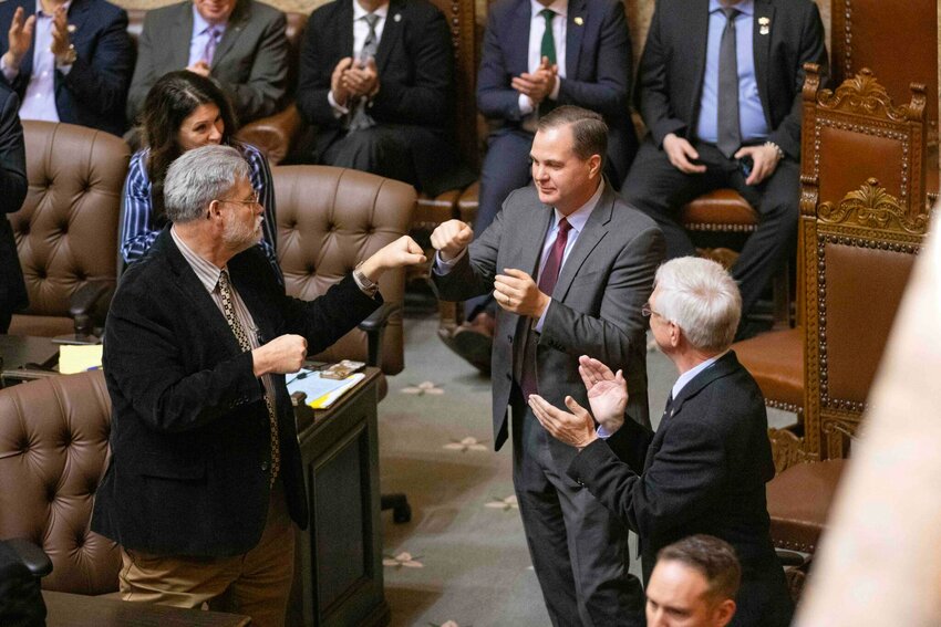 Senate Minority Leader John Braun, R-Centralia, fist bumps Rep. Ed Orcutt, R-Kalama, during Gov. Bob Ferguson&rsquo;s inaugural address on Jan. 15, 2025, at the state Capitol in Olympia. On Friday, April 25, Braun challenged legislation to cap rent increases on the grounds that it was drafted in a way that did not comply with Senate rules. The move was successful and delayed a vote on the bill. (Photo by Ryan Berry/Washington State Standard)