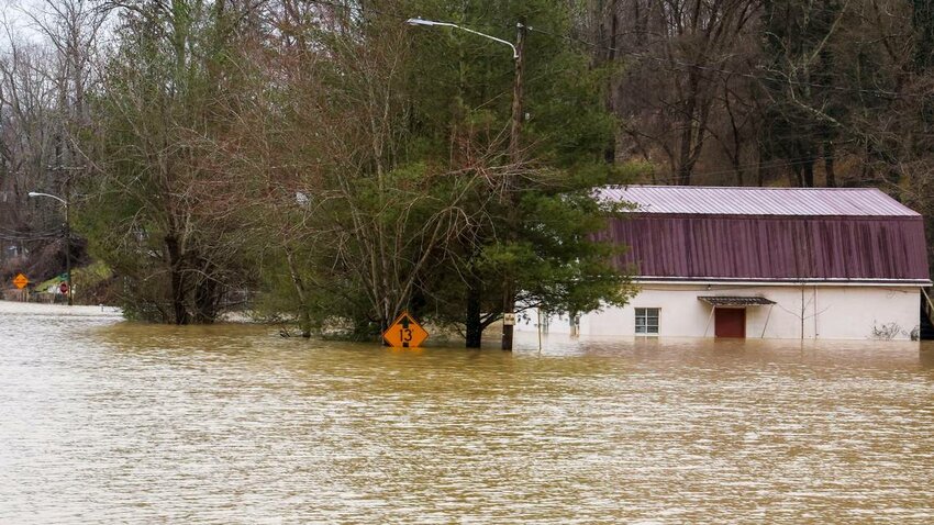 Flood waters and buildings along West Main Street, Sunday, Feb. 14, 2025, in Beattyville, Kentucky, after severe overnight rain hit the Eastern Kentucky town, leaving many parts of the town flooded.