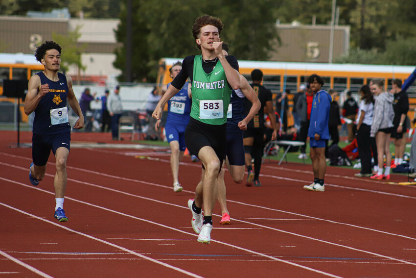 Tumwater's Josh Schlecht approaches the finish line in the 400-meter dash at the Shelton Invitational at HighClimber Stadium on Saturday, May 3.